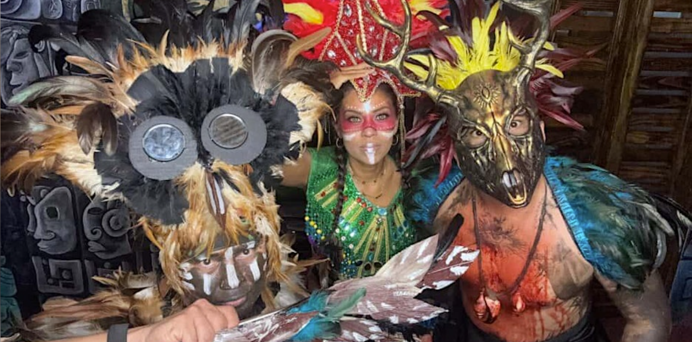 The Maya Experience cultural performance overwater at sunset in San Pedro, Belize