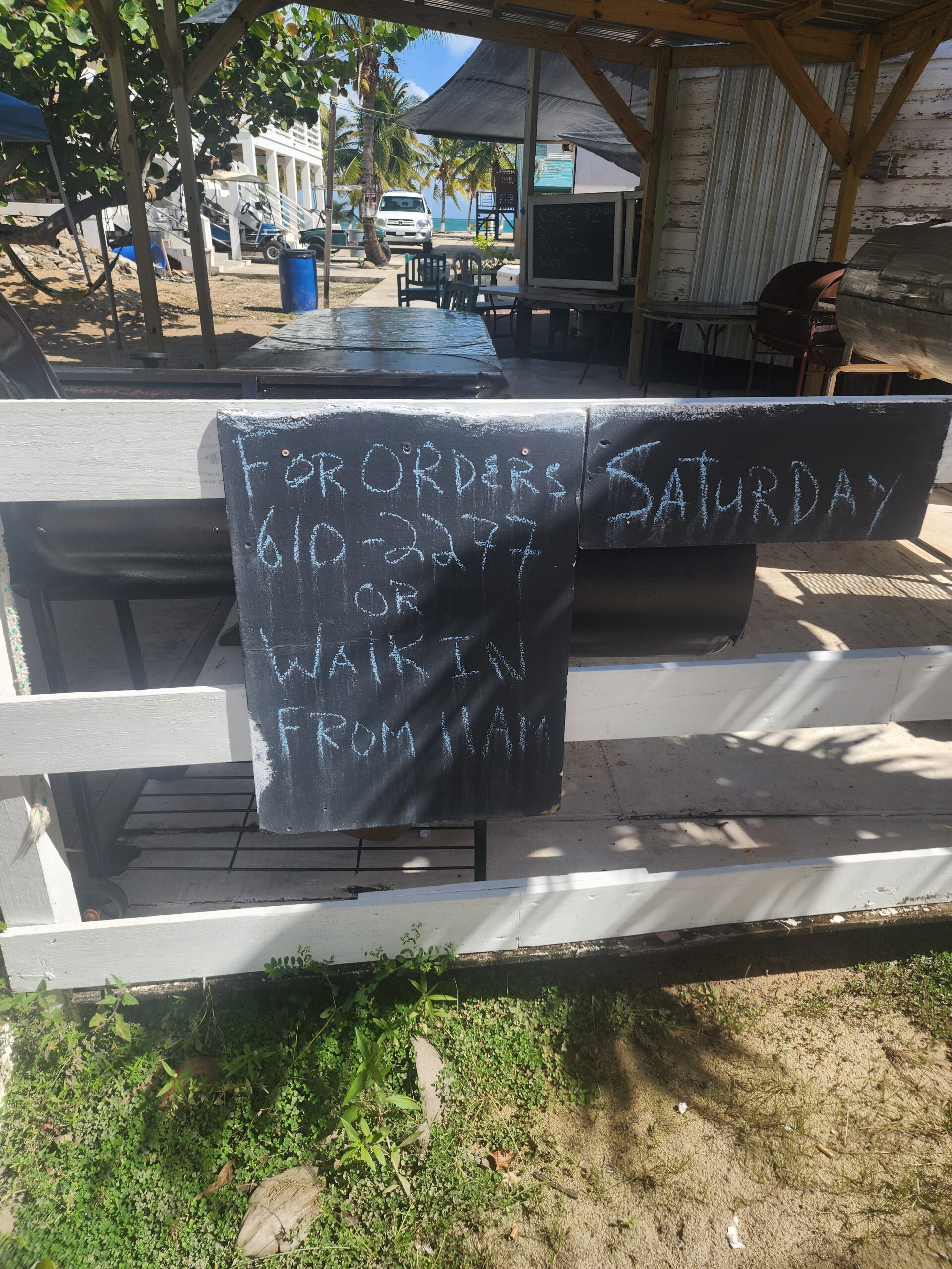 BBQ grill and seating at Young’s Finger Lickin’ BBQ